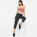 Mulheres Leggings calças de ioga calças cortadas calças esportivas de cordas de gado mulheres corredores de capri respiráveis ​​com bolso